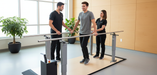 Armedica parallel bars physical therapy equipment featuring a 15-foot 3-piece platform and stainless steel handrails.