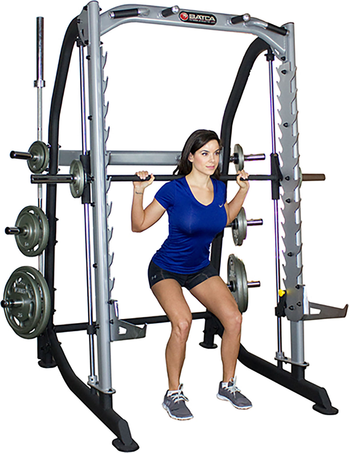 Smith Trainer featuring free bar safety catches and integrated weight holders for controlled workouts