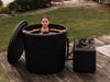 Cold plunge tub in use with connected Ice Barrel chiller for recovery and wellness