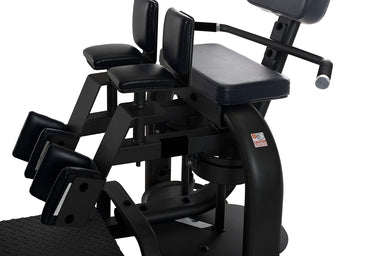 Dual-function thigh workout machine featuring 13 start positions, padded supports, and a platinum finish for home or gym.