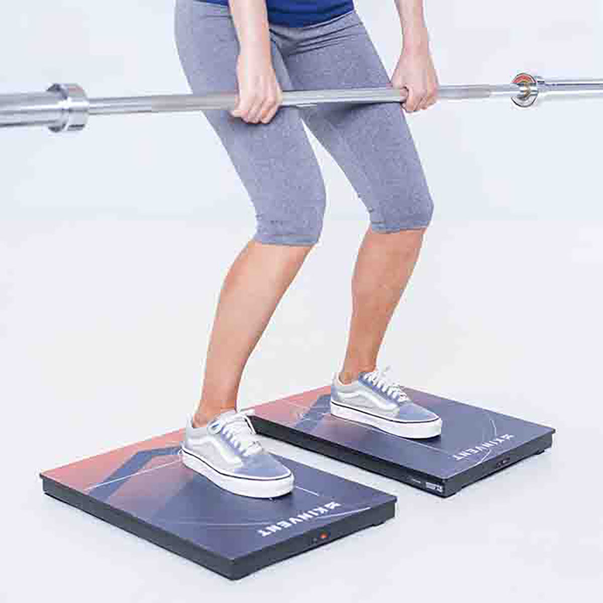 High-capacity Kinvent Deltas Force Plates used for measuring athlete jump height and lower-limb symmetry in a gym.