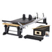 Merrithew Pilates Reformer featuring adjustable settings and smooth carriage glide for professional studio workouts.
