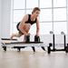 The Merrithew At Home SPX Reformer is a reformer machine that combines smooth resistance and easy adjustments for powerful, low-impact workouts.
