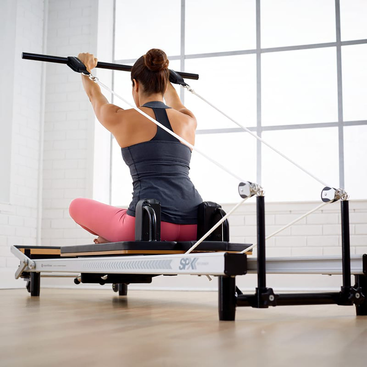 The Merrithew At Home SPX Reformer Package delivers smooth resistance and adjustable settings in a compact design for full-body strength, flexibility, and core training.