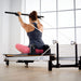 The Merrithew At Home SPX Reformer Package delivers smooth resistance and adjustable settings in a compact design for full-body strength, flexibility, and core training.