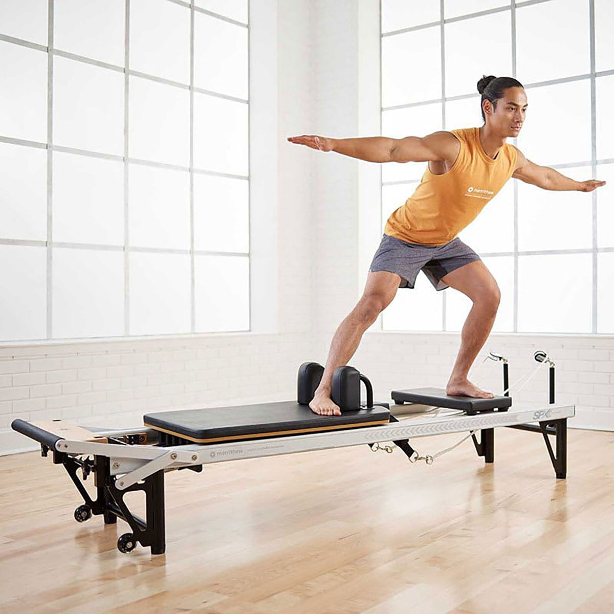 The Merrithew Elevated Pilates At Home SPX Reformer Package is a premium Pilates reformer machine that enhances strength, flexibility, and alignment, making it perfect for gyms and dedicated individuals.