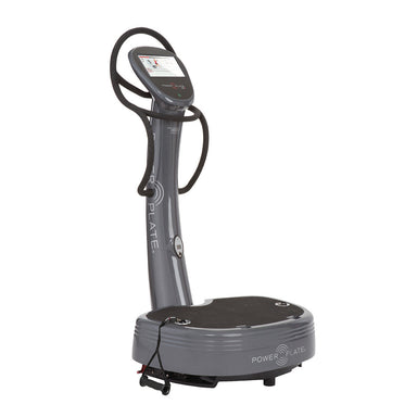 Power plate machine My7 featuring an integrated LCD touchscreen and retractable resistance training handles.