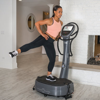 Power plate machine My7 featuring an integrated LCD touchscreen and retractable resistance training handles.