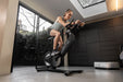 Power Plate Exercise Machine combining cycling and vibration training for improved muscle activation and performance.