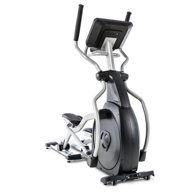 Spirit fitness elliptical CE800ENT with a heavy-duty steel frame, USB charging port, and built-in cooling fan for users.