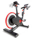 High-performance spirit fitness bike with 4-way seat adjustability and integrated dumbbell holders for cross-training.