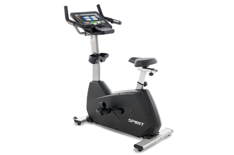 Spirit CU800ENT commercial upright bike featuring a 15.6 inch touchscreen entertainment console and heavy-duty frame.