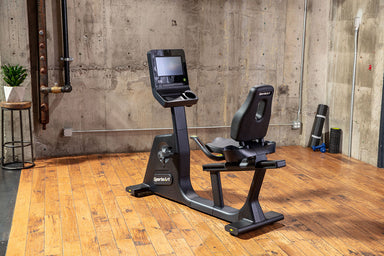 SportsArt C574R is a Commercial recumbent bike with step-through design and a 13-inch SENZA display for comfortable cardio training.
