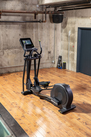 The SportsArt Low Impact Elliptical Machine E874 Elite with 13" Senza Touchscreen provides durable, joint-friendly cardio training with advanced performance features.