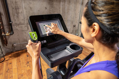 The SportsArt Low Impact Elliptical Machine E874 Elite with 13" Senza Touchscreen provides durable, joint-friendly cardio training with advanced performance features.