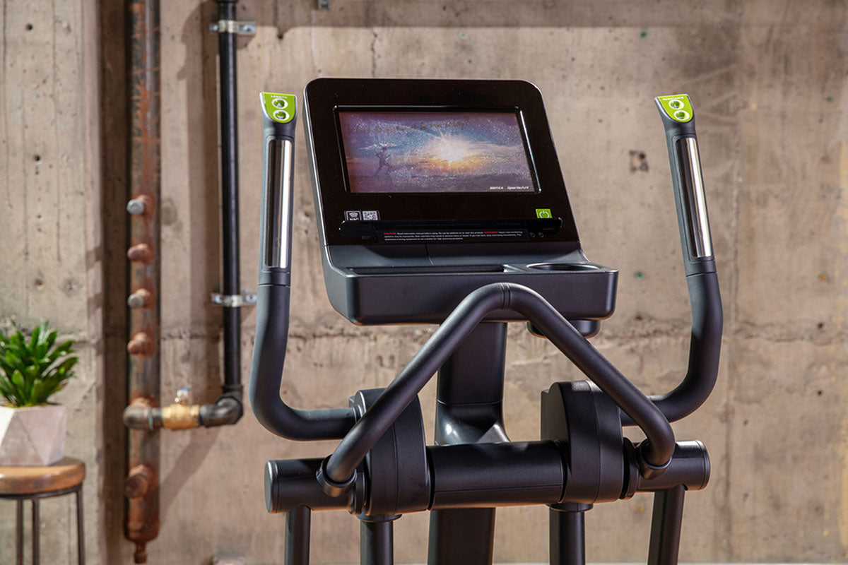 The SportsArt Low Impact Elliptical Machine E874 Elite with 13" Senza Touchscreen is designed for smooth, joint-friendly workouts—perfect for gyms and fitness enthusiasts.