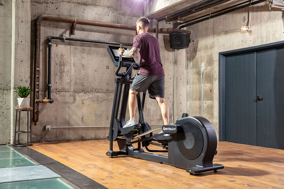 The SportsArt Low Impact Elliptical Machine E874 Elite with 13" Senza Touchscreen is designed for smooth, joint-friendly workouts—perfect for gyms and fitness enthusiasts.