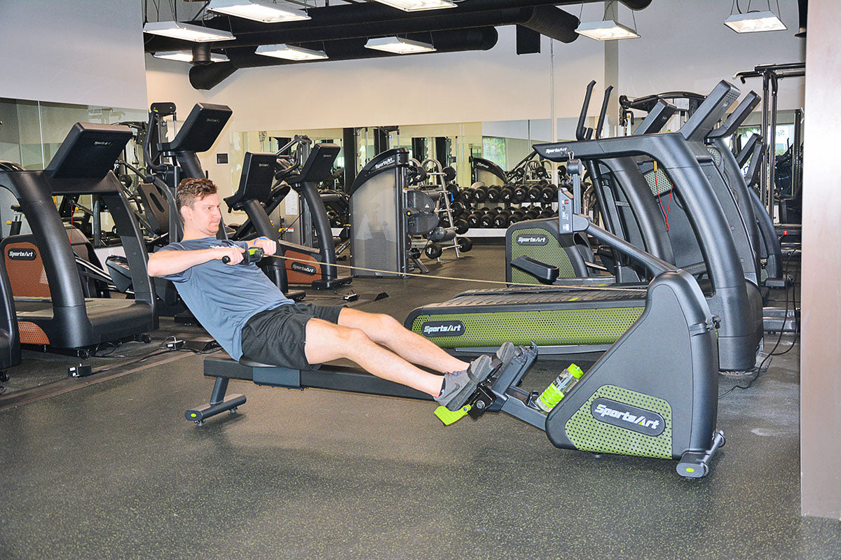 SportsArt G260 is an indoor rower with ergonomic foot pedals and wireless resistance for efficient commercial rowing workouts.