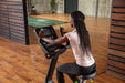 The SportsArt G574U Elite Eco-Powr is an upright stationary bike that boosts endurance, burns calories, and improves cardiovascular health.