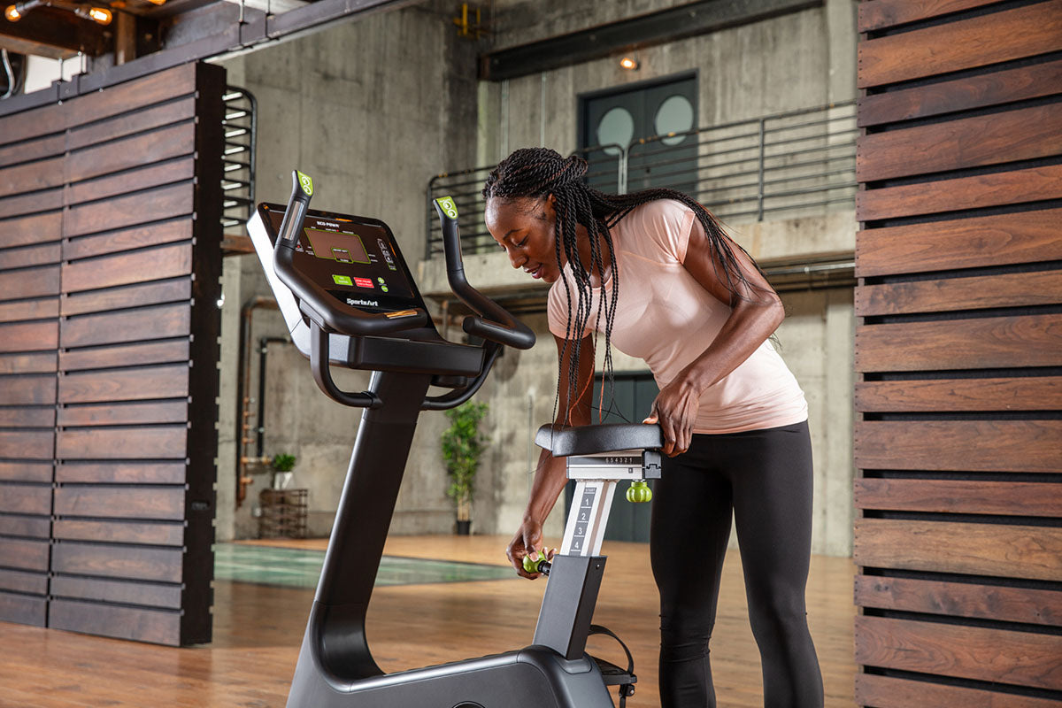 The SportsArt G574U Elite Eco-Powr upright stationary bike enhances endurance, strengthens the heart, and supports calorie burn.