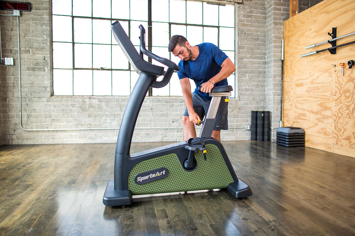 SportsArt G576U is an upright bike featuring adjustable ergonomic seating and fingertip resistance controls for effective workouts.