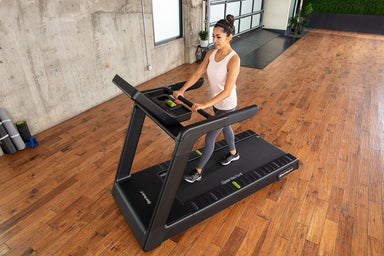 SportsArt Fitness T673 Prime Eco-Natural commercial treadmill enhances workouts with advanced cushioning, eco-friendly design and lasting reliability for gyms