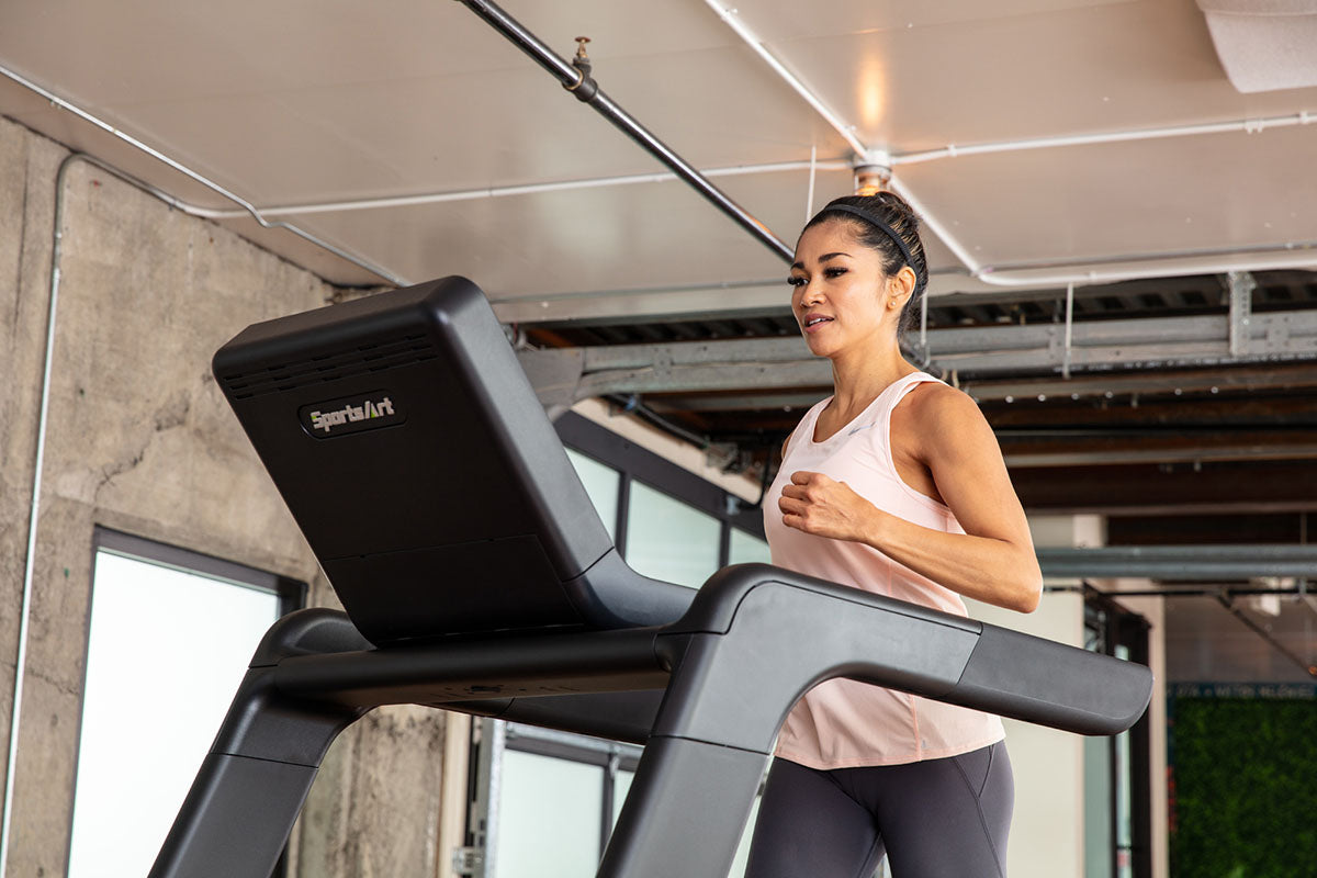 SportsArt Fitness T673 Prime Eco-Natural commercial treadmill enhances workouts with advanced cushioning, eco-friendly design and lasting reliability for gyms