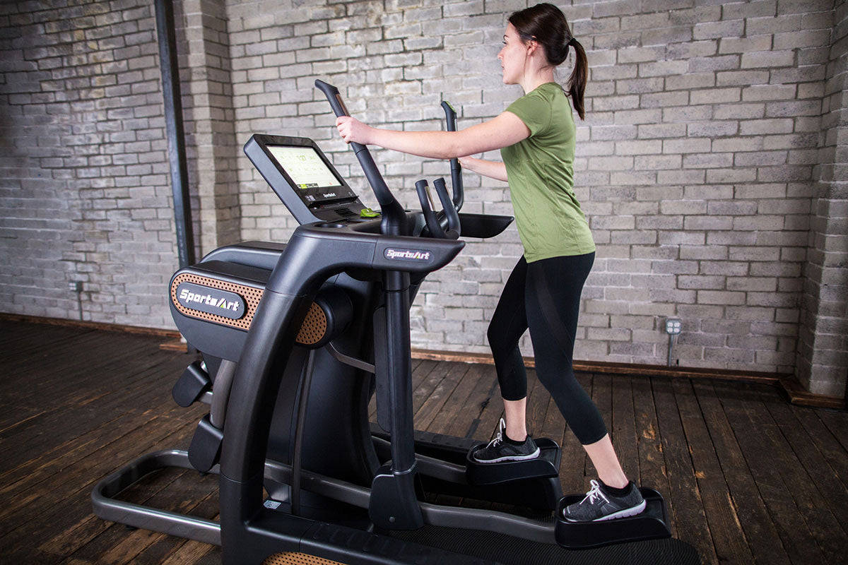 Experience the SportsArt V886 Verso Status Cross Trainer with 16" Senza Touchscreen—heavy-duty, low-impact, and versatile cardio for gyms & enthusiasts.
