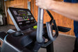The SportsArt Cross Trainer V886 Verso Status Eco-Natural is a heavy-duty cross trainer machine offering low-impact, full-body workouts, customizable resistance, and immersive entertainment.